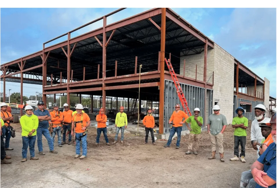 Coleman Goodemote crews gathered for a safety briefing on an active construction site