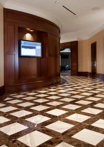 Finished office lobby corridor with marble flooring