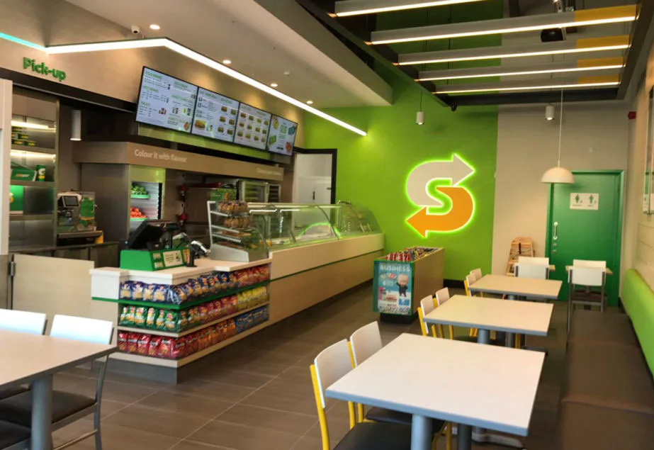 Service line and dining area inside the DeLand Subway